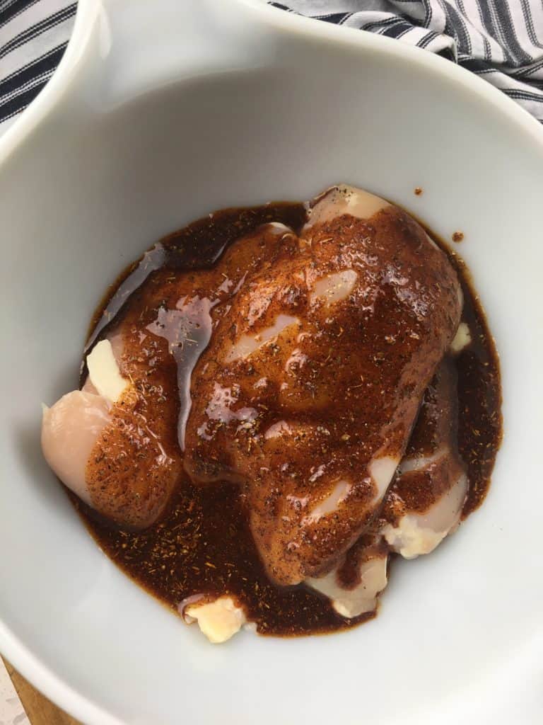 cover chicken in marinade